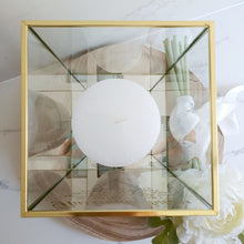 Load image into Gallery viewer, gold brass look candle stand with white pillar candle

