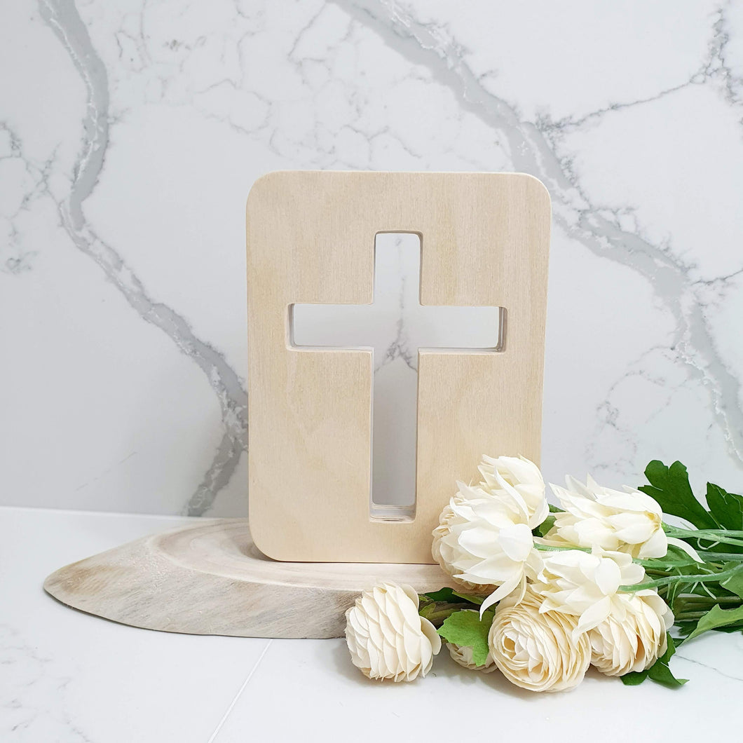 Bring warmth, light, and comfort into your space with our handcrafted Original Cross Night Light – designed to inspire peace, hope, and faith. Each light is made from premium European Beechwood and finished with a safe, water-based varnish.

✔️ Available in Orthodox or Latin styles
✔️ Two sizes to suit every room
✔️ Optional Saint engraving on the bottom corner
✔️ Built-in dimmer for adjustable light
✔️ Choose from plug-in or battery-rechargeable models

The soft glow makes it perfect for a child’s room, pr